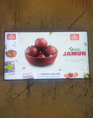 Digital signage display in Bombay sweets shop